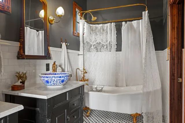 a bathroom with a sink and a mirror