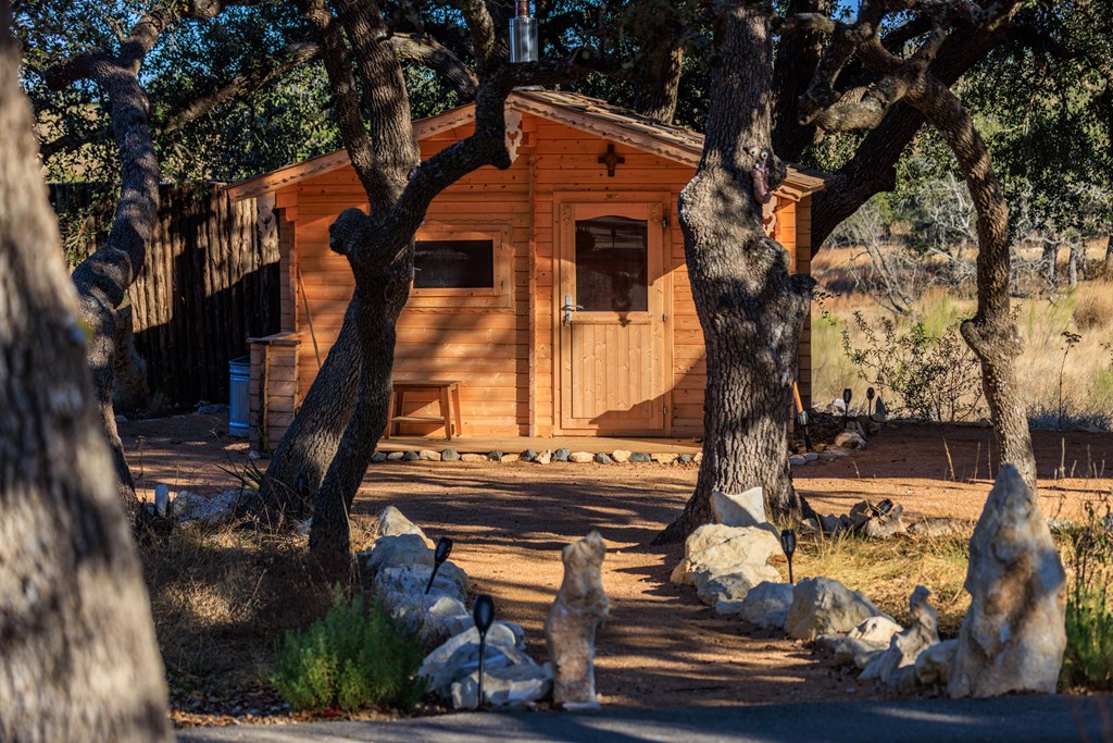 162 Flowering Sage Lane Comfort, TX 78013 - Photo 36 of 74 a backyard of a house with lots of green space