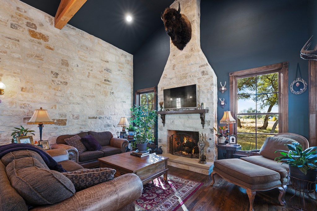 162 Flowering Sage Lane Comfort, TX 78013 - Photo 7 of 74 a living room with furniture and a fireplace