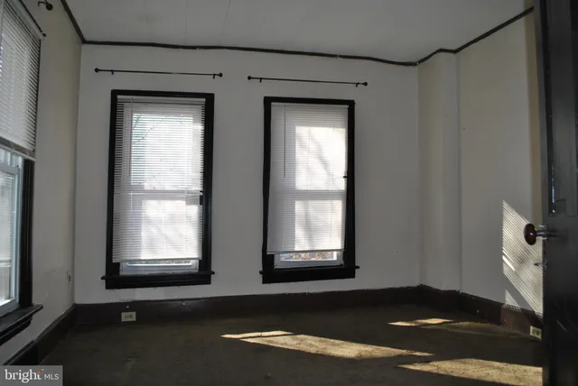 an empty room with a window