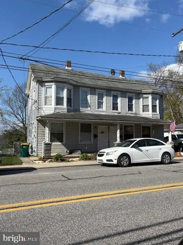 a car parked in front of a building