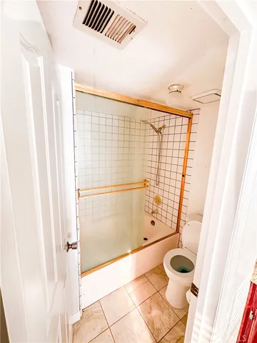 a bathroom with a sink and a shower