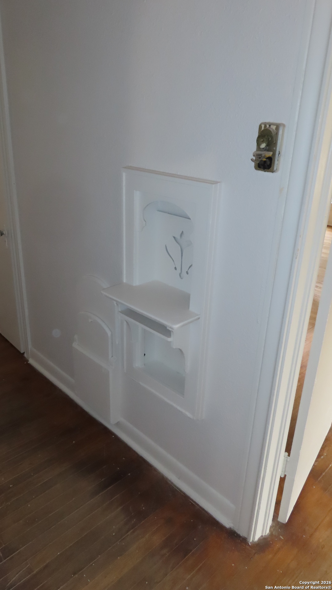 3423 South WW White Road San Antonio, TX 78222 - Photo 13 of 20 an empty room with wooden floor and closet