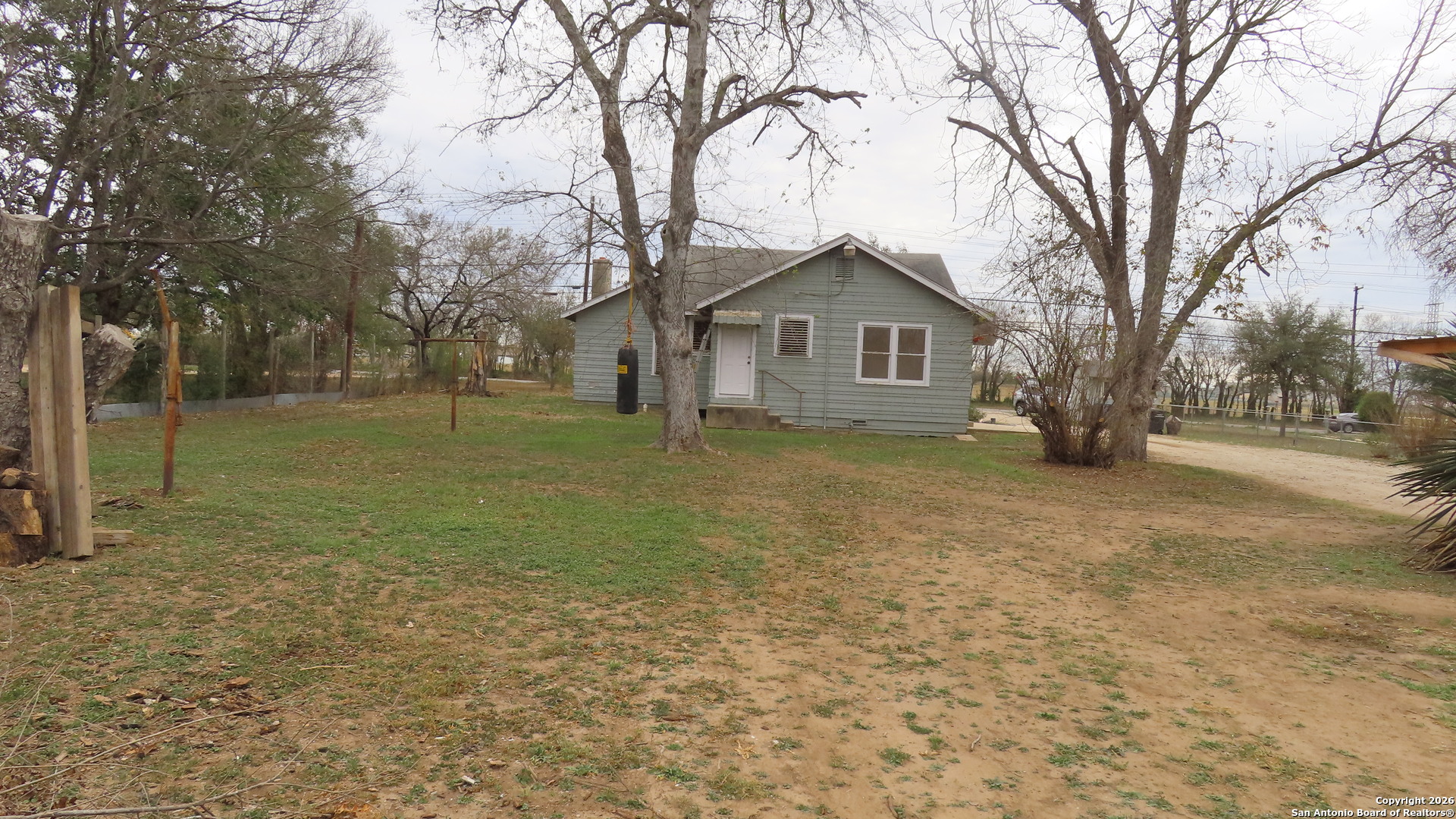 3423 South WW White Road San Antonio, TX 78222 - Photo 17 of 20 a view of a house with a yard