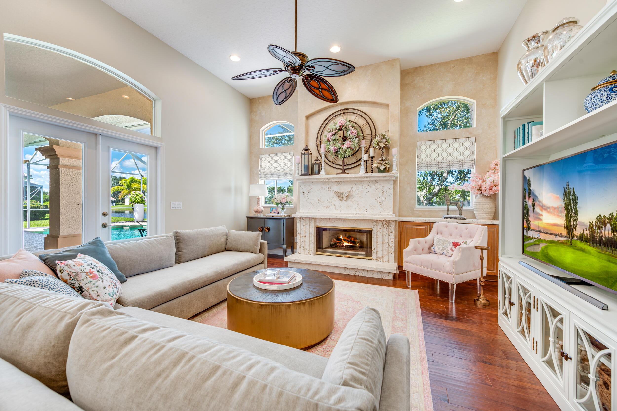 4130 Stoney Point Road Melbourne, FL 32940 - Photo 11 of 40 a living room with furniture and a flat screen tv