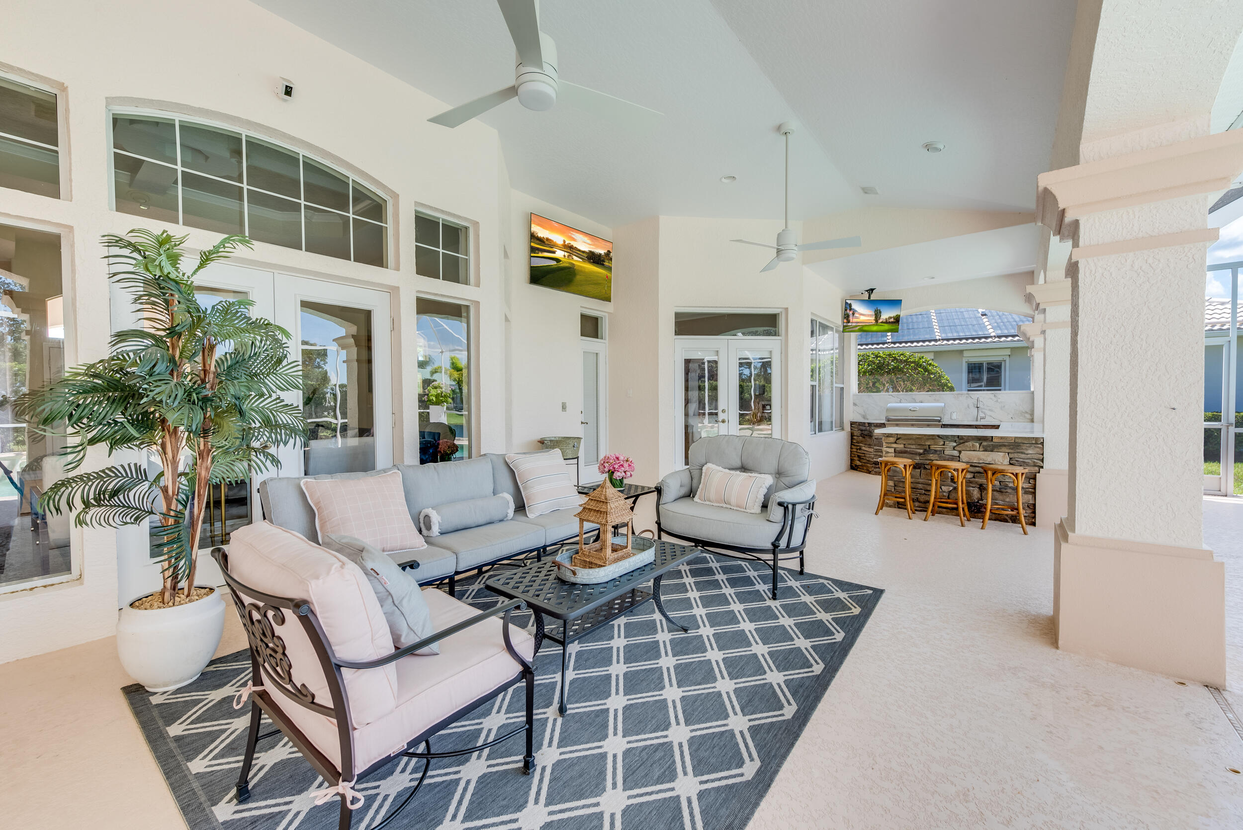 4130 Stoney Point Road Melbourne, FL 32940 - Photo 14 of 40 a living room with furniture and a potted plant