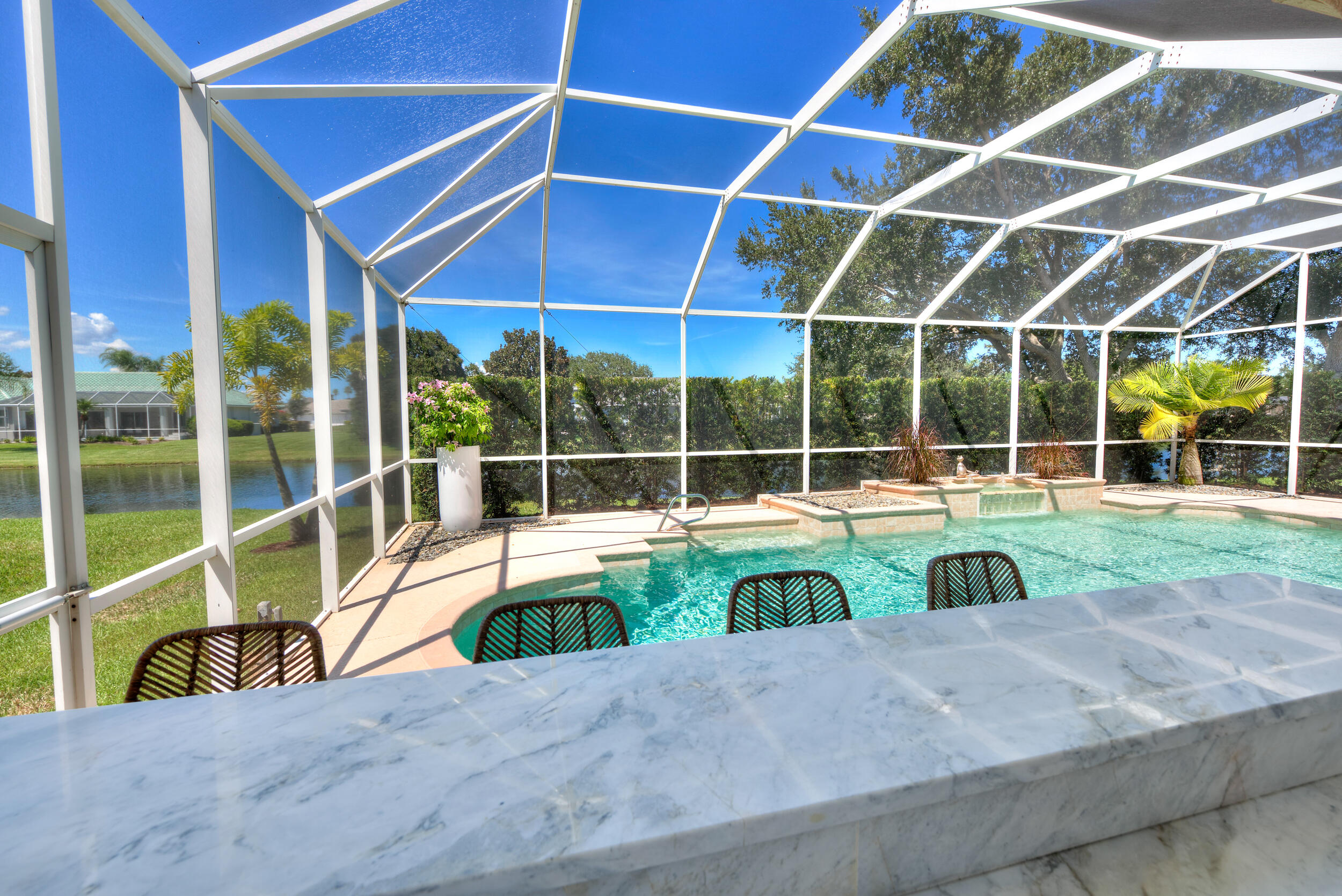 4130 Stoney Point Road Melbourne, FL 32940 - Photo 17 of 40 a view of a swimming pool with a yard