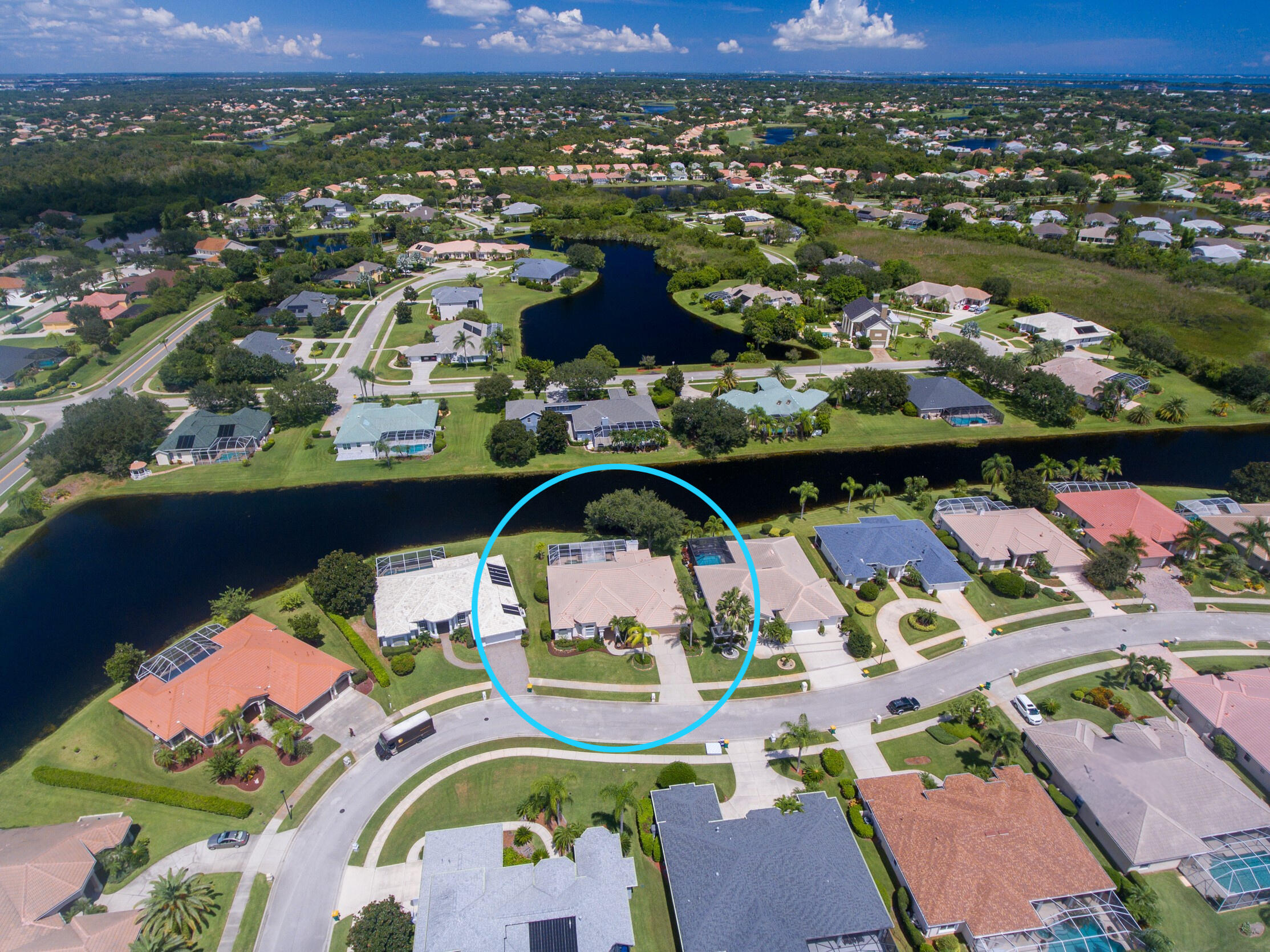 4130 Stoney Point Road Melbourne, FL 32940 - Photo 2 of 40 an aerial view of a swimming pool patio and mountain view