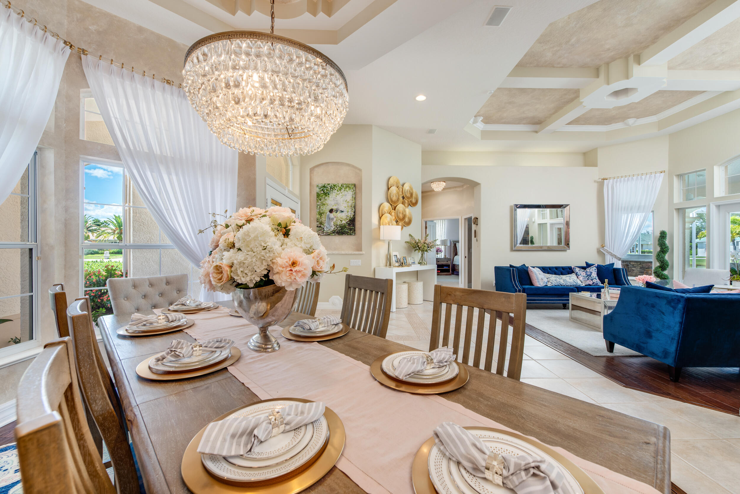 4130 Stoney Point Road Melbourne, FL 32940 - Photo 26 of 40 a living room with furniture and a chandelier