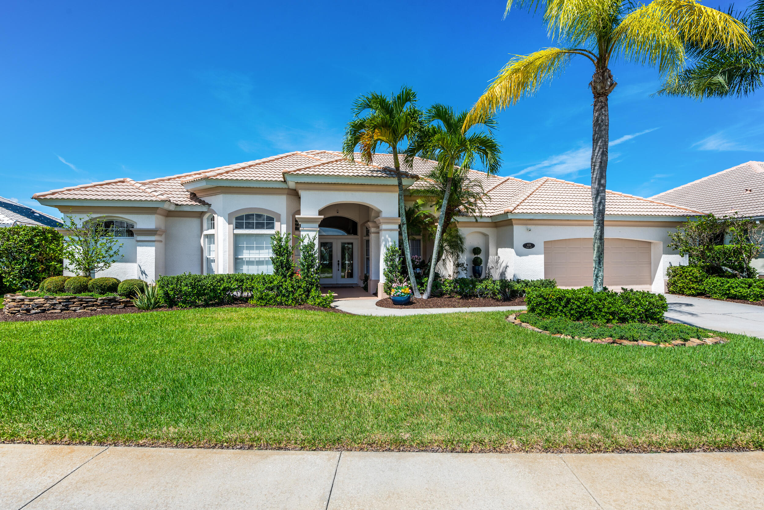 4130 Stoney Point Road Melbourne, FL 32940 - Photo 38 of 40 a view of house with garden and tall trees