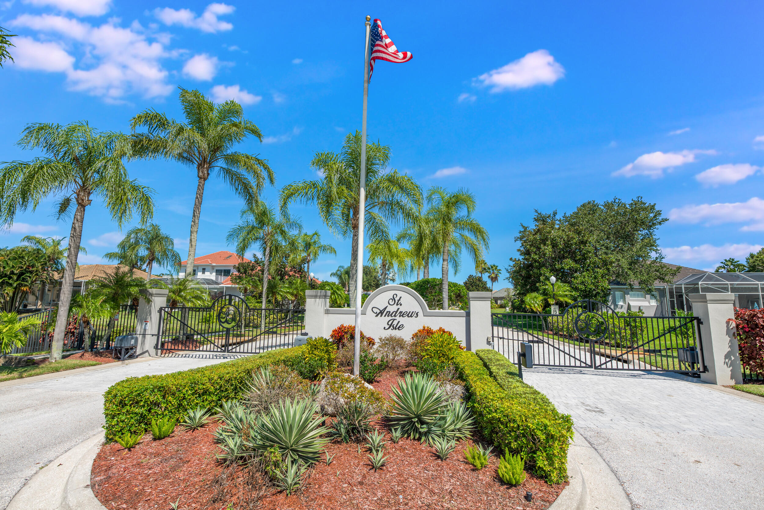 4130 Stoney Point Road Melbourne, FL 32940 - Photo 40 of 40 a front view of a house with a yard and potted plants