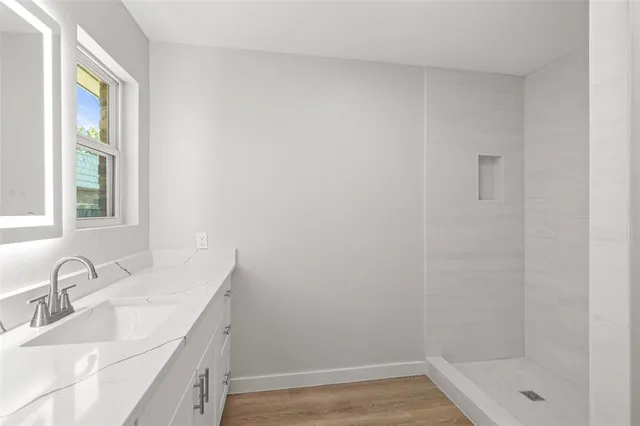 a bathroom with a sink and a bathtub