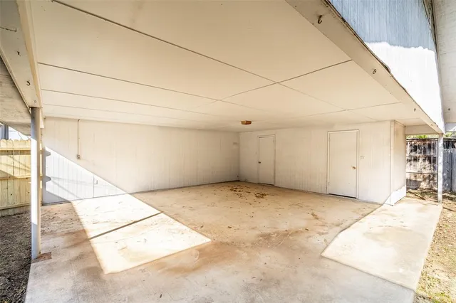 a view of a backyard with a patio