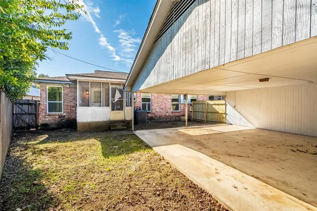 a view of a large kitchen with a large window