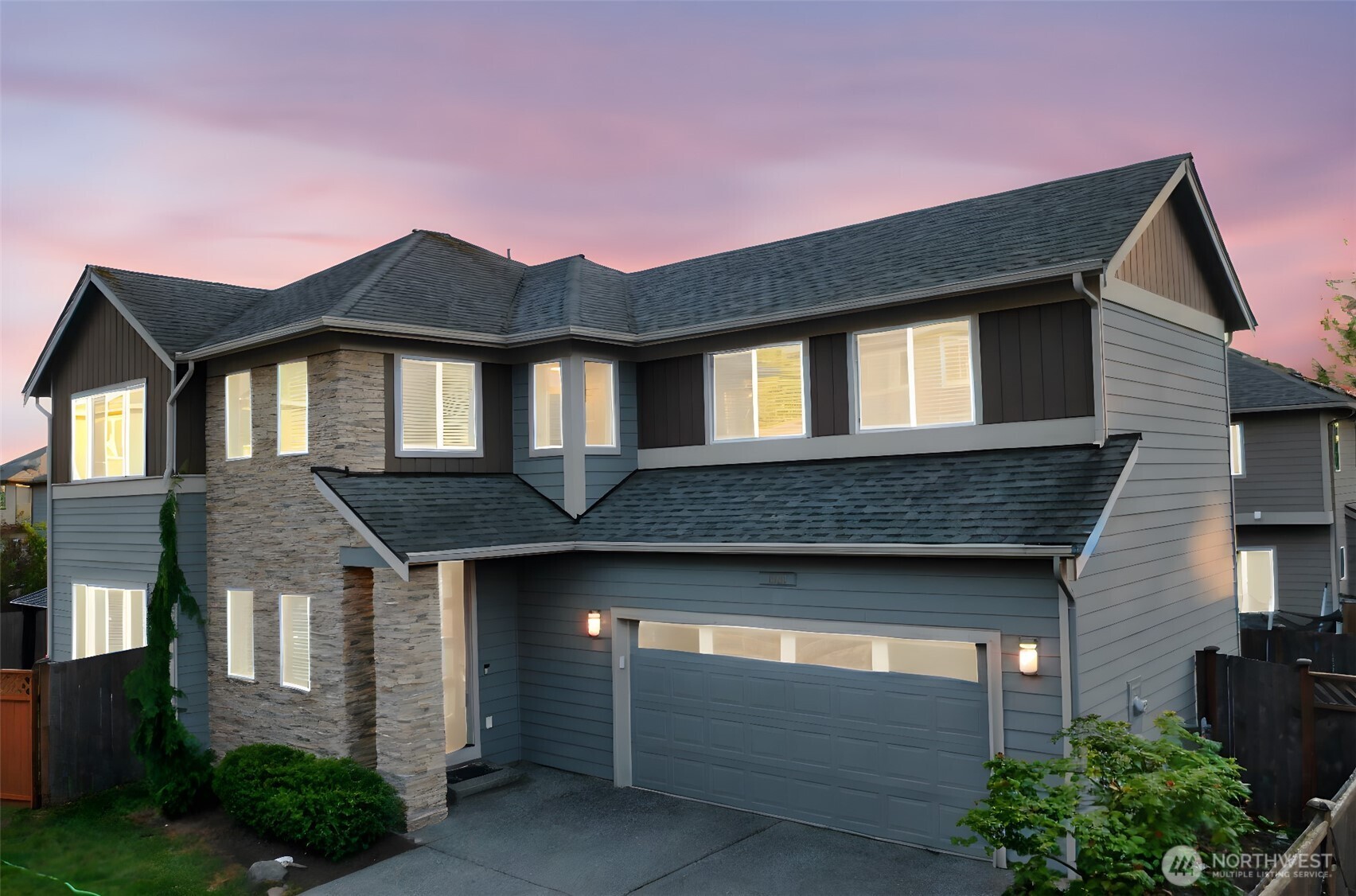 4408 214th Place Southeast Bothell, WA 98021 - Photo 1 of 33 a front view of a house with yard