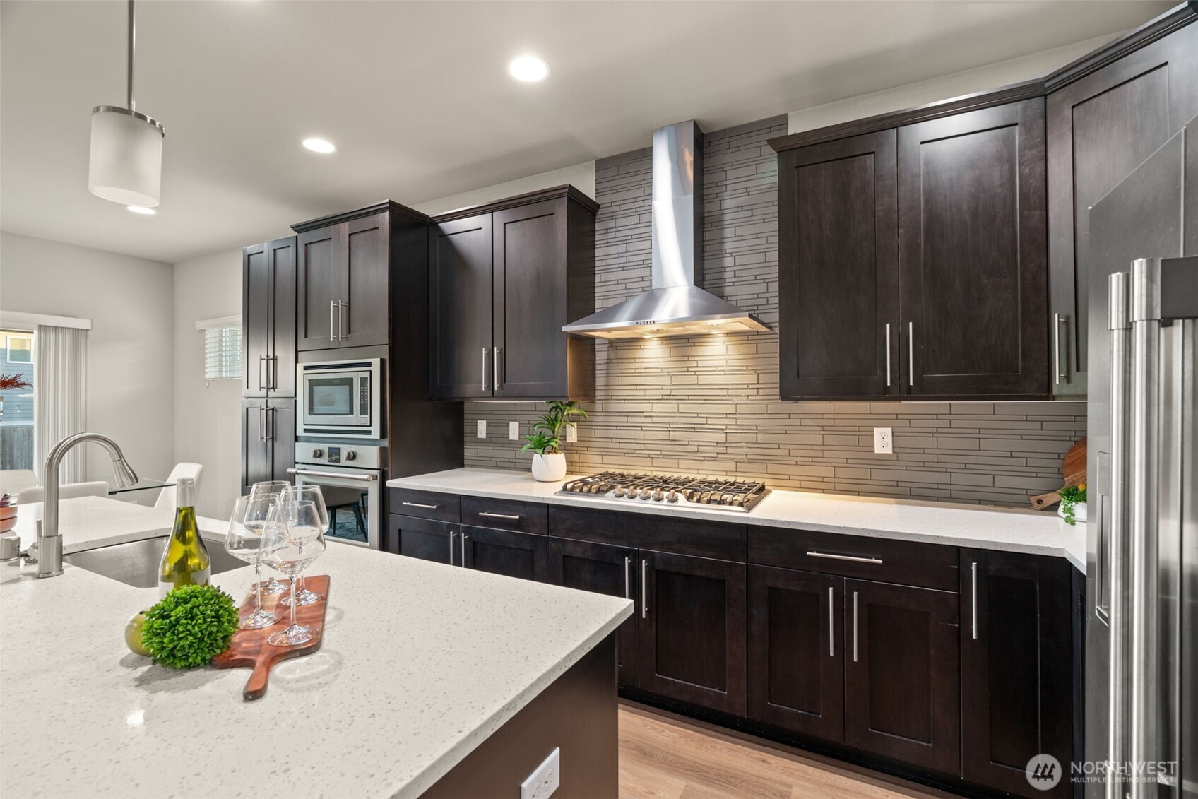 4408 214th Place Southeast Bothell, WA 98021 - Photo 16 of 33 a kitchen with a refrigerator and a sink