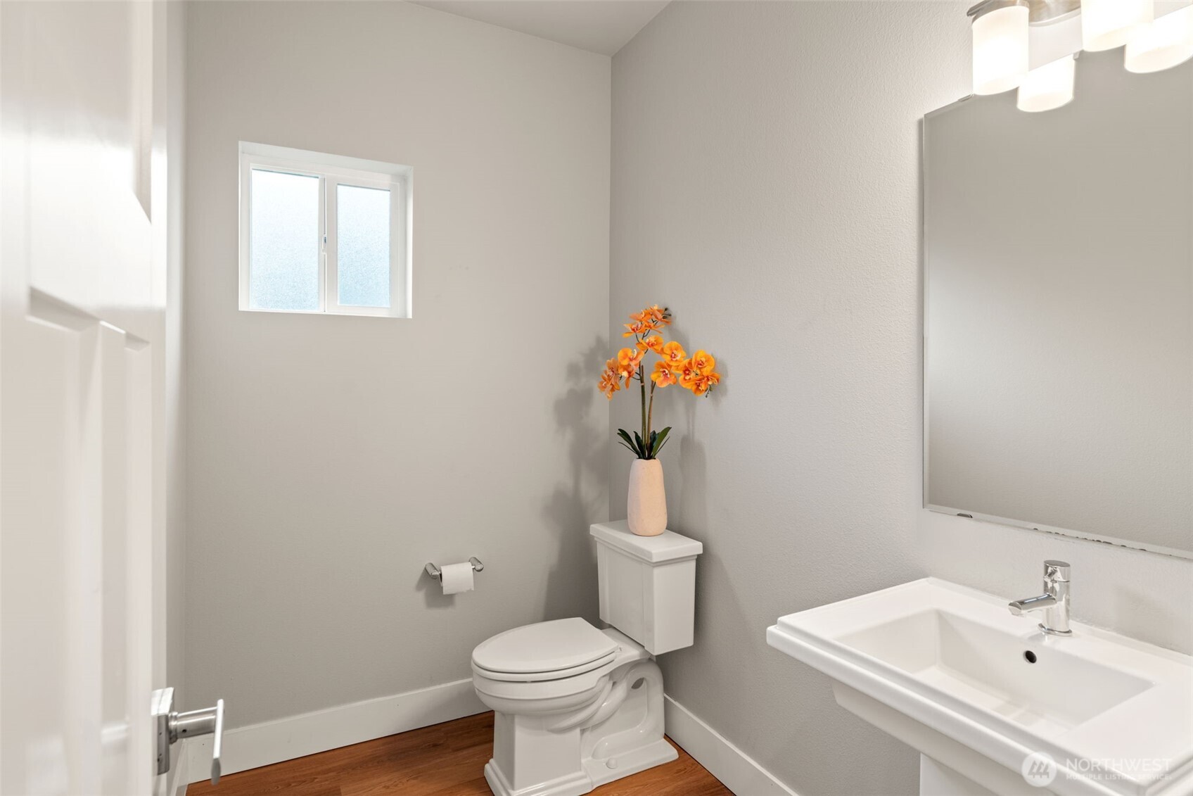 4408 214th Place Southeast Bothell, WA 98021 - Photo 19 of 33 a white toilet sitting next to a bathroom sink