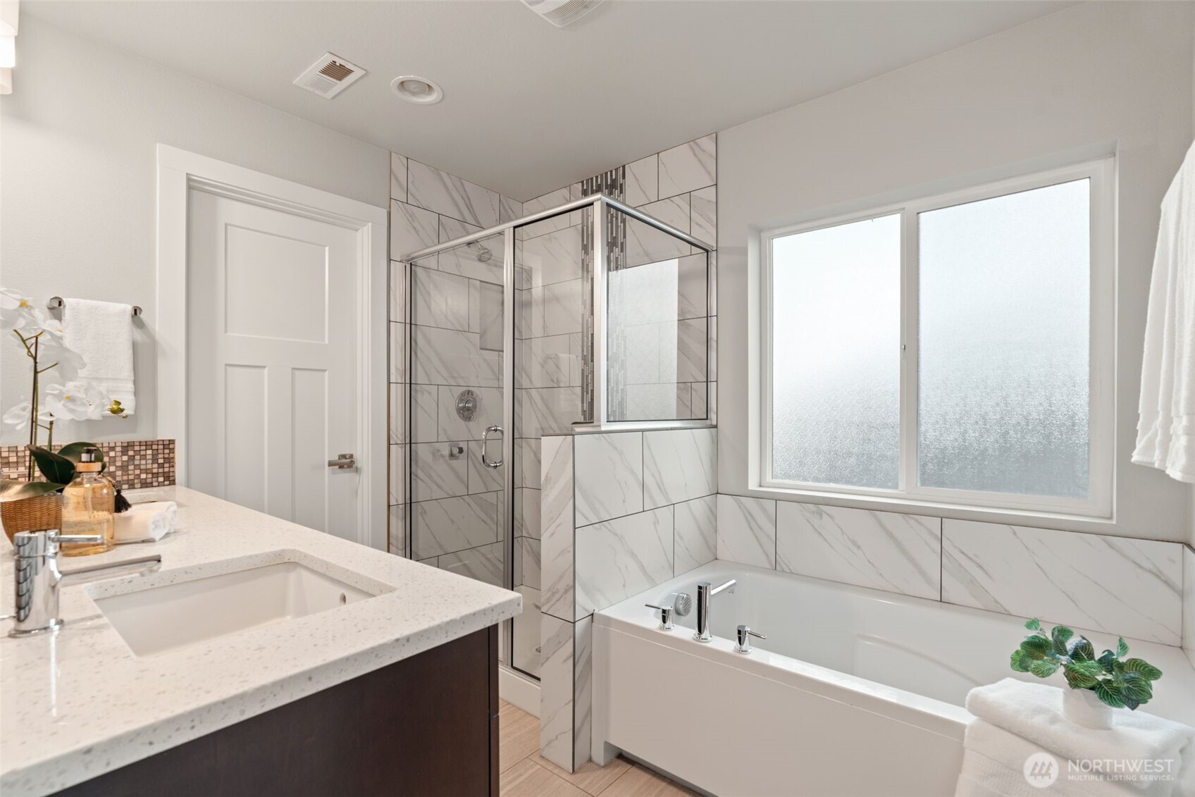 4408 214th Place Southeast Bothell, WA 98021 - Photo 26 of 33 a bathroom with a tub sink and mirror