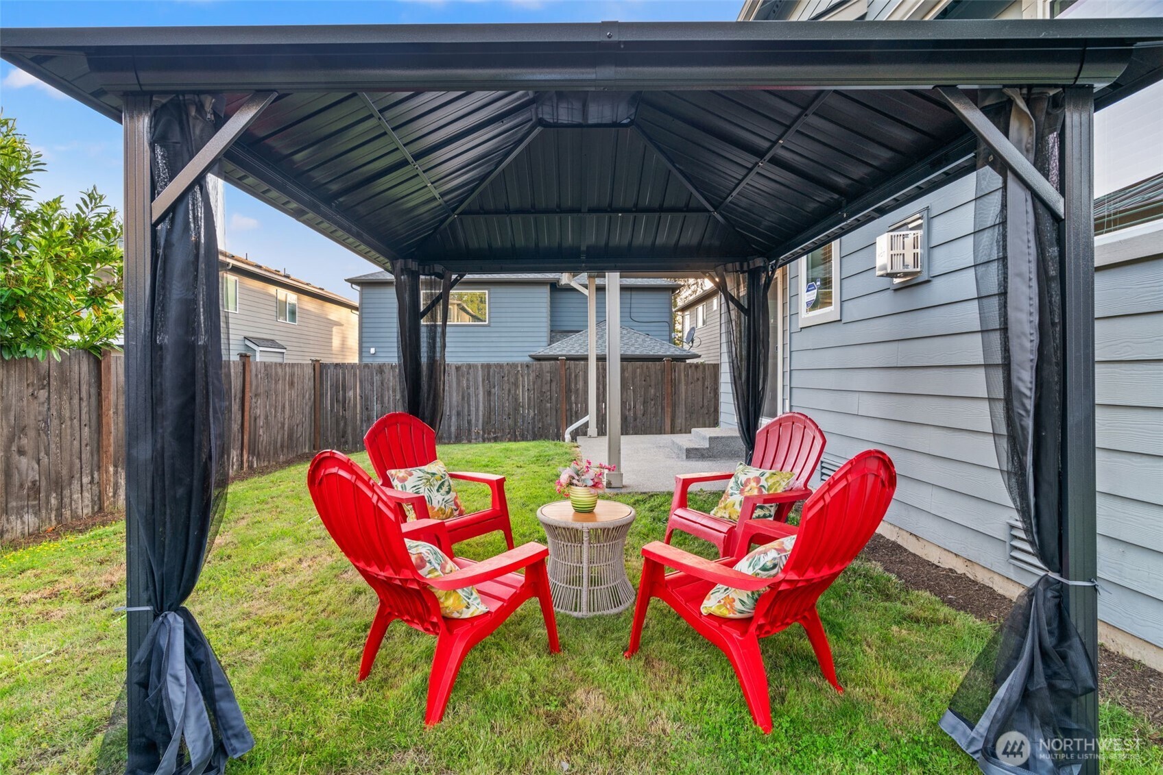 4408 214th Place Southeast Bothell, WA 98021 - Photo 31 of 33 a backyard of a house with seating space