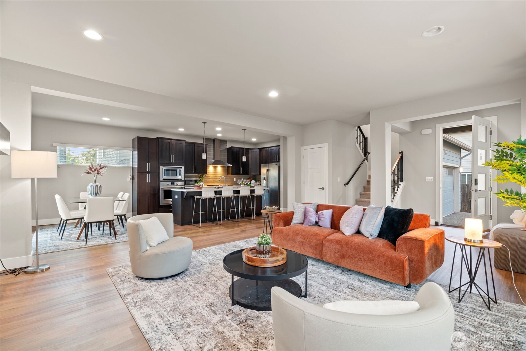 4408 214th Place Southeast Bothell, WA 98021 - Photo 8 of 33 a living room with furniture and kitchen view