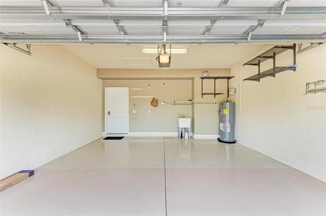 a view of a livingroom with furniture and a window