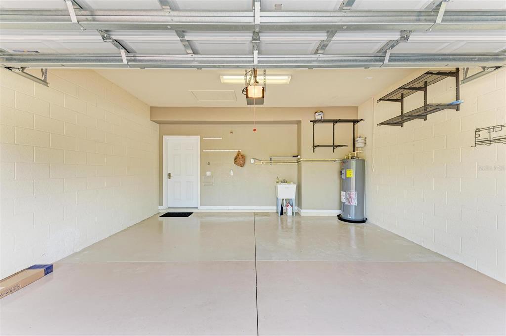 424 Winding Brook Lane, Unit 104 Bradenton, FL 34212 - Photo 36 of 72 a view of a room with rack on the wall