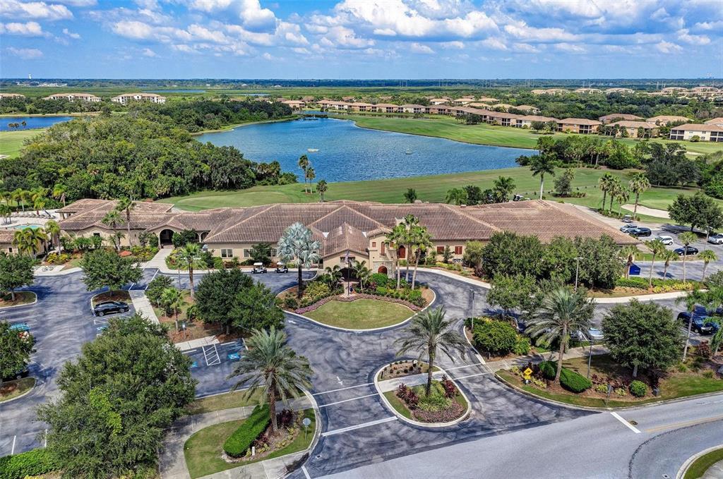 424 Winding Brook Lane, Unit 104 Bradenton, FL 34212 - Photo 47 of 72 an aerial view of a house with a garden and outdoor space