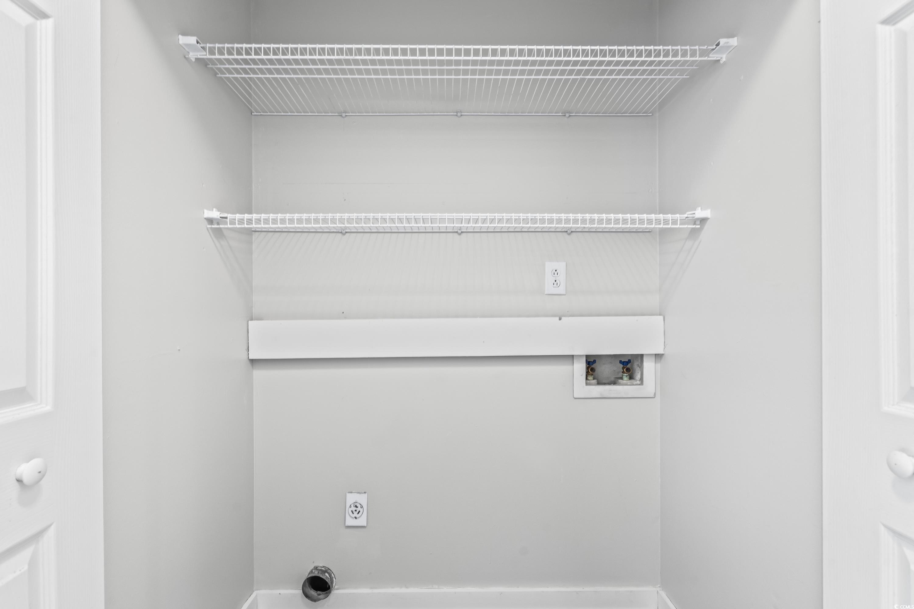 4115 Little River Road, Unit 1E Myrtle Beach, SC 29577 - Photo 23 of 38 Laundry room featuring hookup for a washing machine and electric dryer hookup