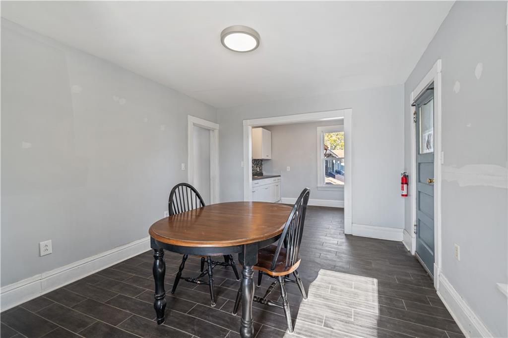 726 Market Street, Unit 3 Beaver, PA 15009 - Photo 11 of 24 a dining room with furniture and wooden floor