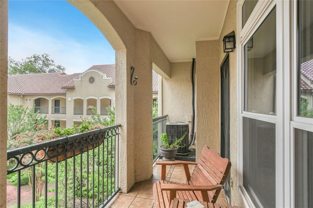 955 Juniper Street Northeast, Unit 4324 Atlanta, GA 30309 - Photo 18 of 26 a view of a porch with a floor to ceiling window