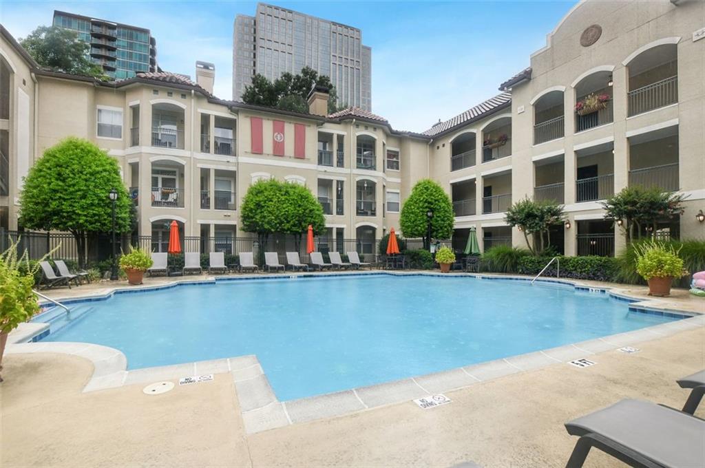 955 Juniper Street Northeast, Unit 4324 Atlanta, GA 30309 - Photo 22 of 26 a front view of residential houses with yard