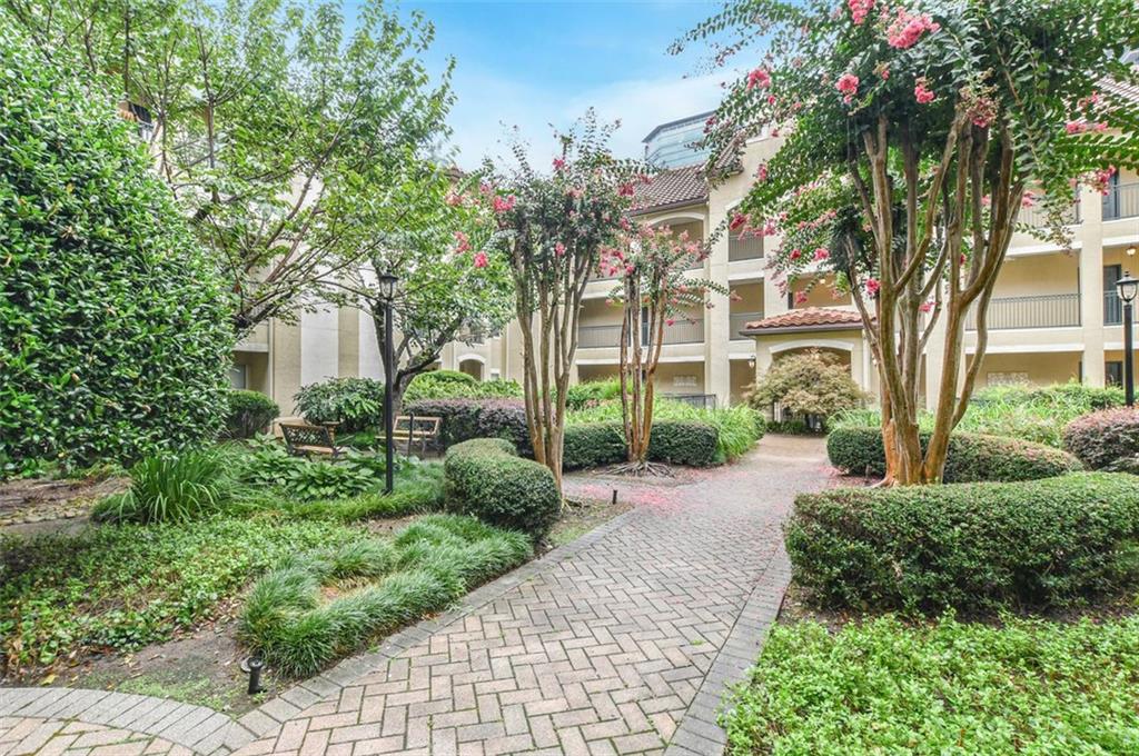 955 Juniper Street Northeast, Unit 4324 Atlanta, GA 30309 - Photo 24 of 26 a view of a pathway with a house