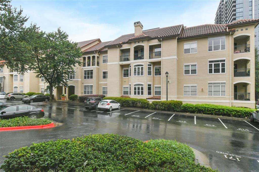 955 Juniper Street Northeast, Unit 4324 Atlanta, GA 30309 - Photo 26 of 26 a front view of a house with lake view