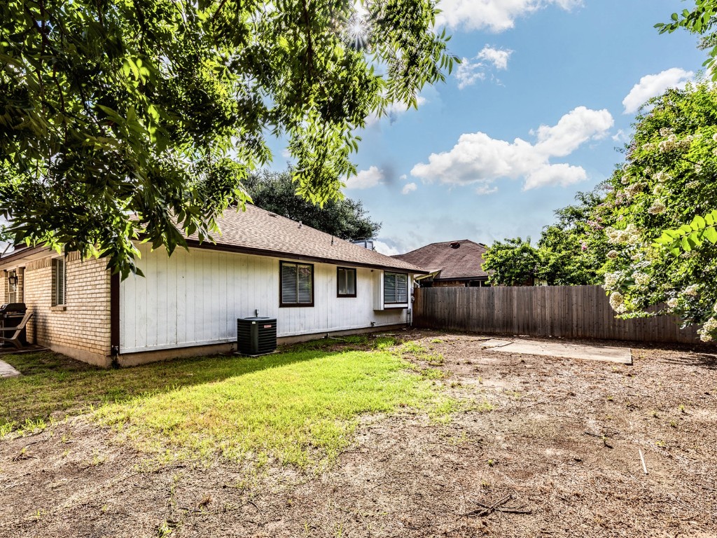 14205 Vandever Street Austin, TX 78725 - Photo 20 of 23 a front view of house with yard and trees
