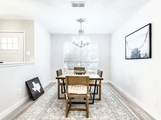 a view of a dining room with furniture