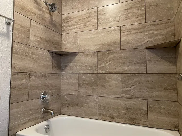 a bathroom with a bathtub