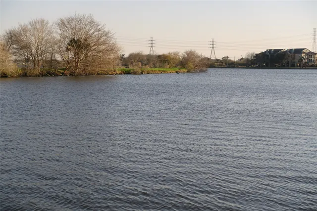 a blue sign that is in front of a house