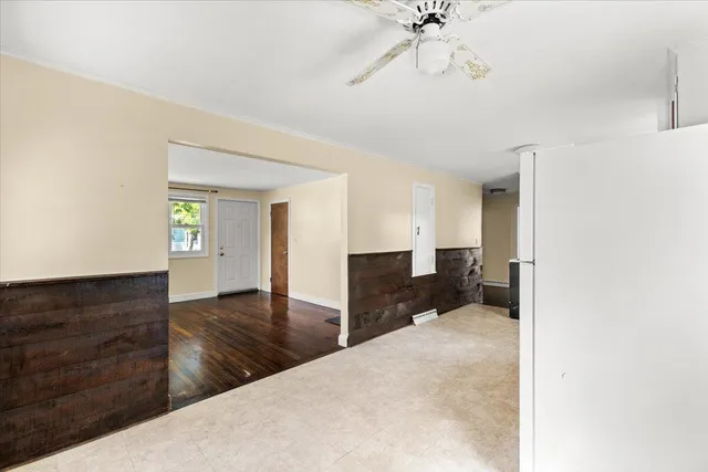 a room with a window and cabinet