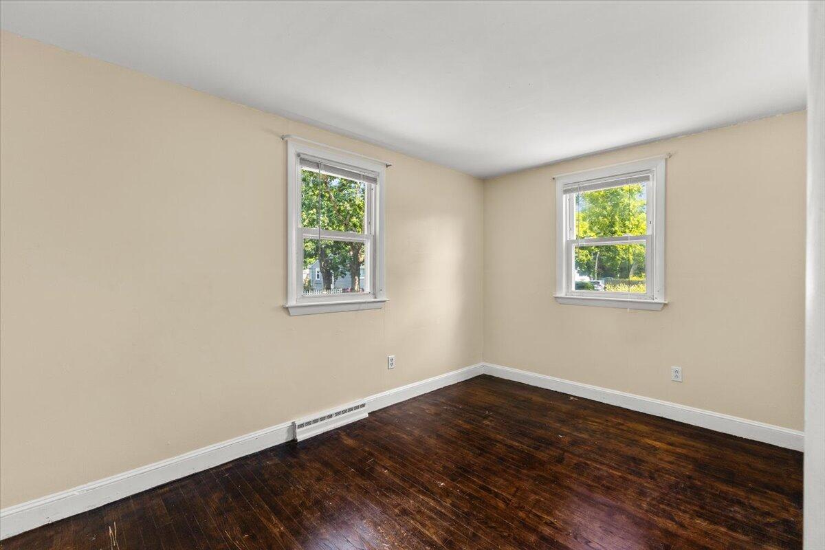74 Fearing Street Buzzards Bay, MA 02532 - Photo 23 of 32 a view of room with hardwood floor and window
