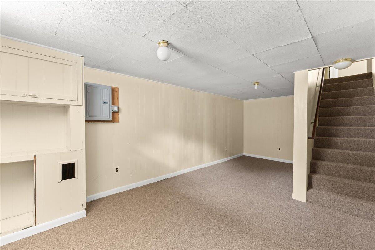 74 Fearing Street Buzzards Bay, MA 02532 - Photo 28 of 32 a view of an empty room with a white walls