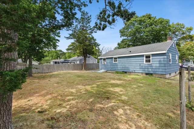 a kitchen with a stove a sink and a refrigerator