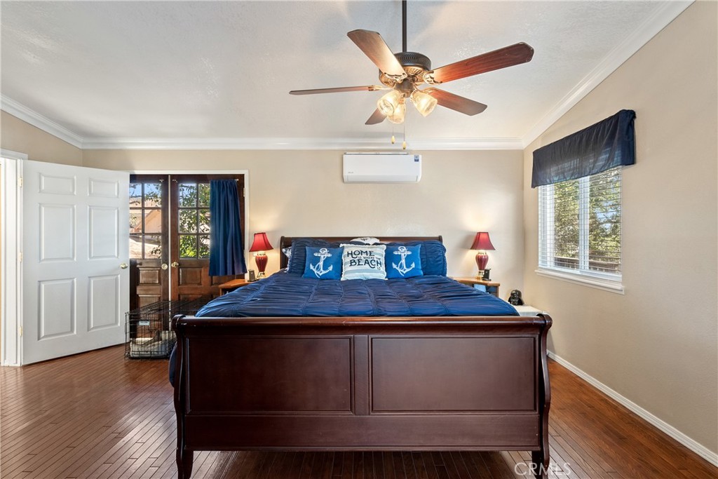 1747 Brighton Avenue Grover Beach, CA 93433 - Photo 22 of 50 a bed sitting in a bedroom next to a window