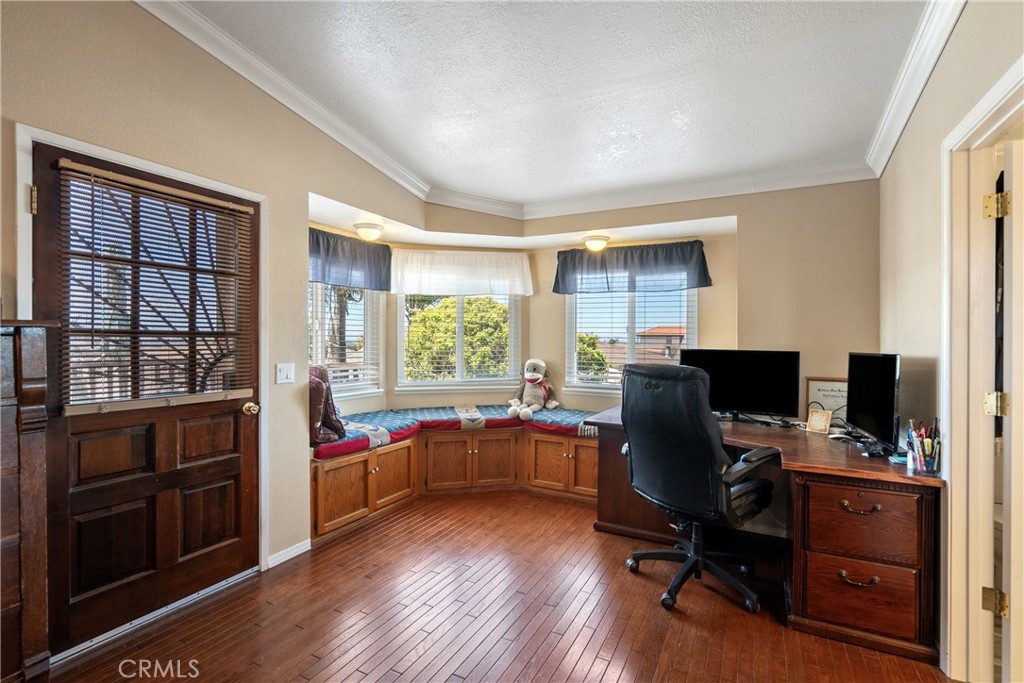 1747 Brighton Avenue Grover Beach, CA 93433 - Photo 23 of 50 a view of a workspace with furniture and a window