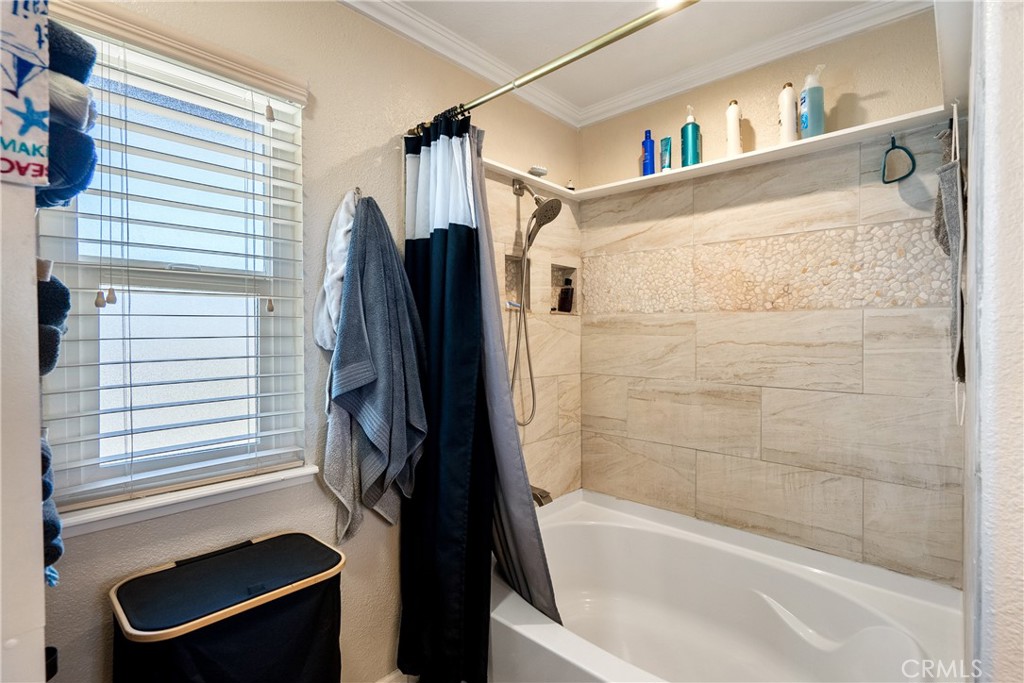 1747 Brighton Avenue Grover Beach, CA 93433 - Photo 25 of 50 a bathroom with a tub and a shower