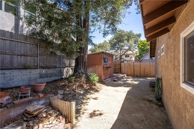 a view of a back yard of the house