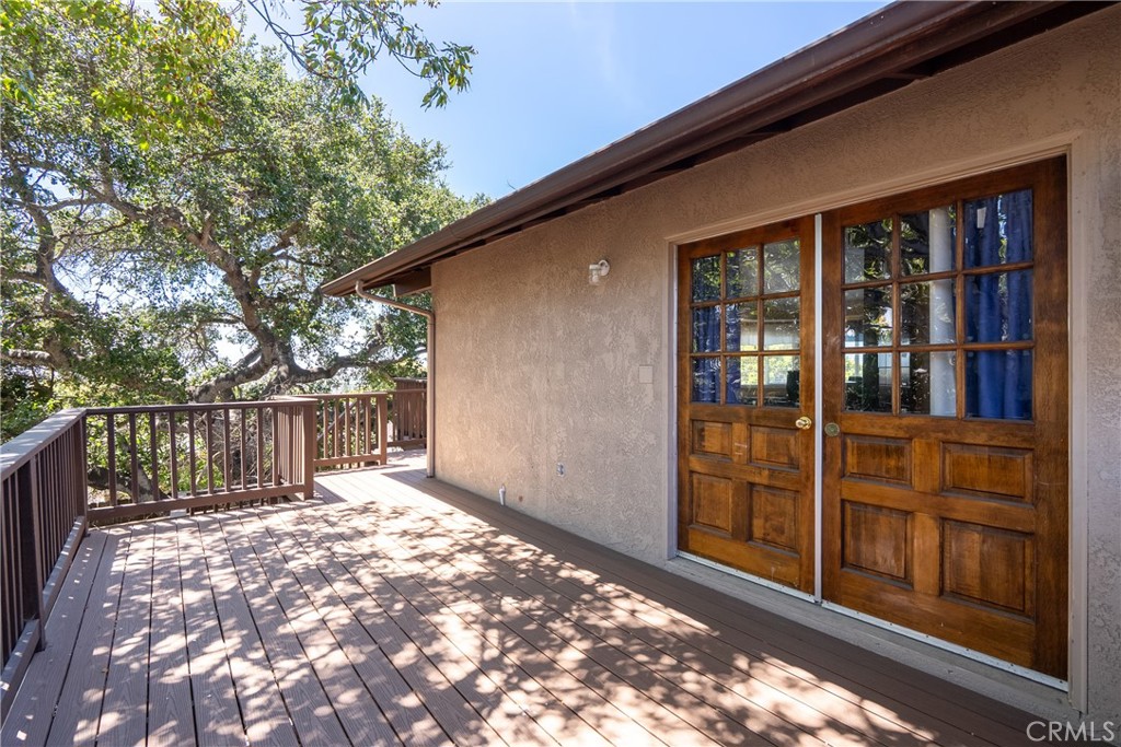 1747 Brighton Avenue Grover Beach, CA 93433 - Photo 42 of 50 a view of backyard with large tree and wooden fence