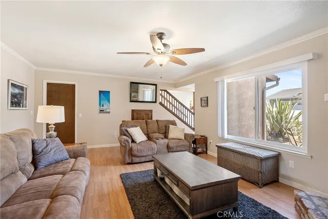 a large kitchen with a table and chairs