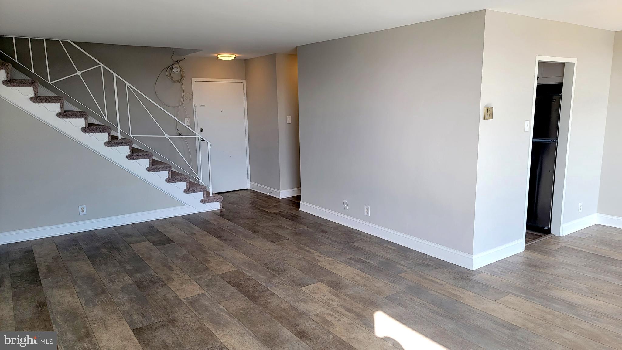 301 North Beauregard Street, Unit 903 Alexandria, VA 22312 - Photo 7 of 19 a view of entryway and hall with wooden floor