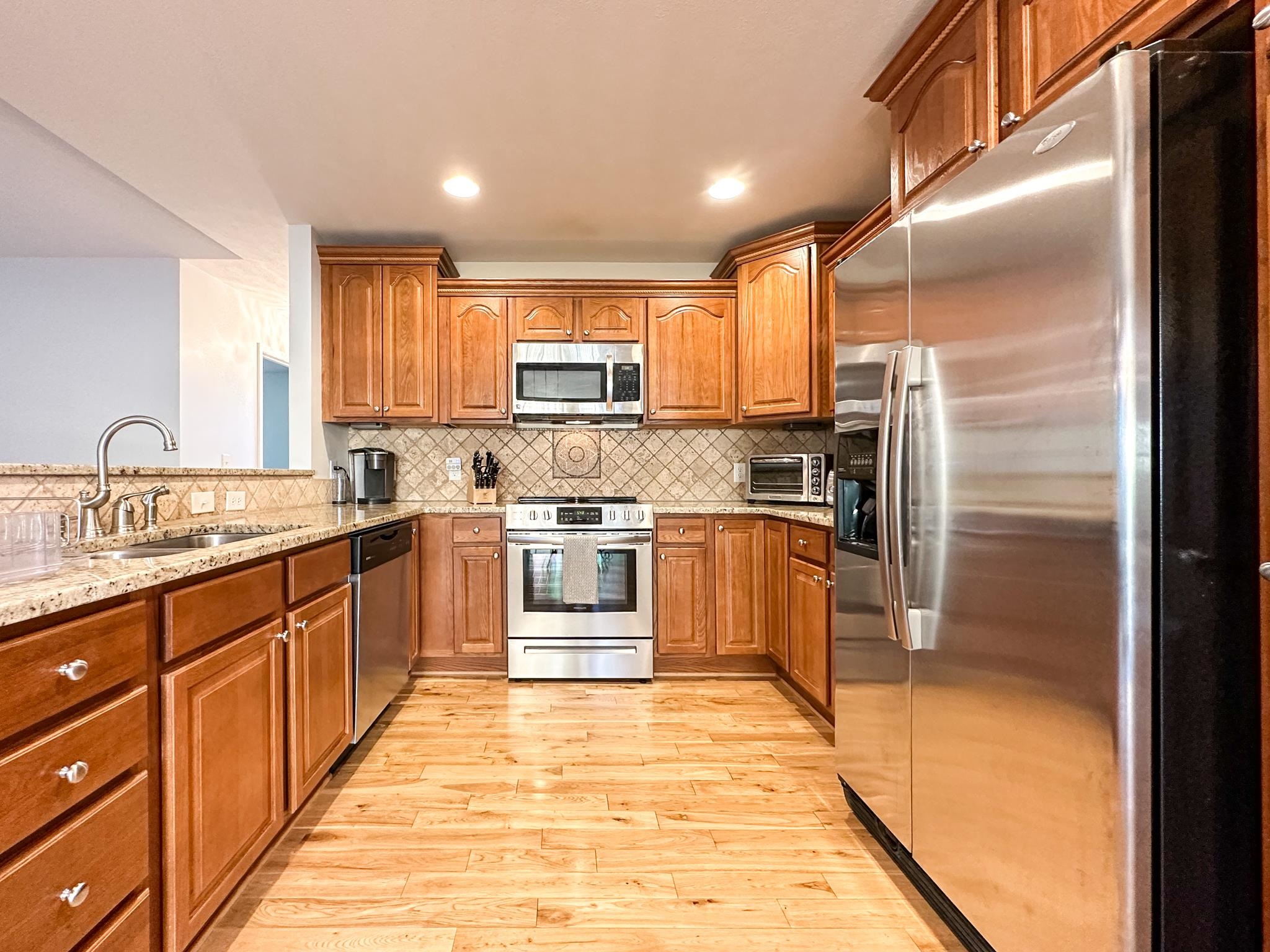 30 Fox Crest Ridge Staunton, VA 24401 - Photo 16 of 31 a kitchen with stainless steel appliances a refrigerator sink and cabinets