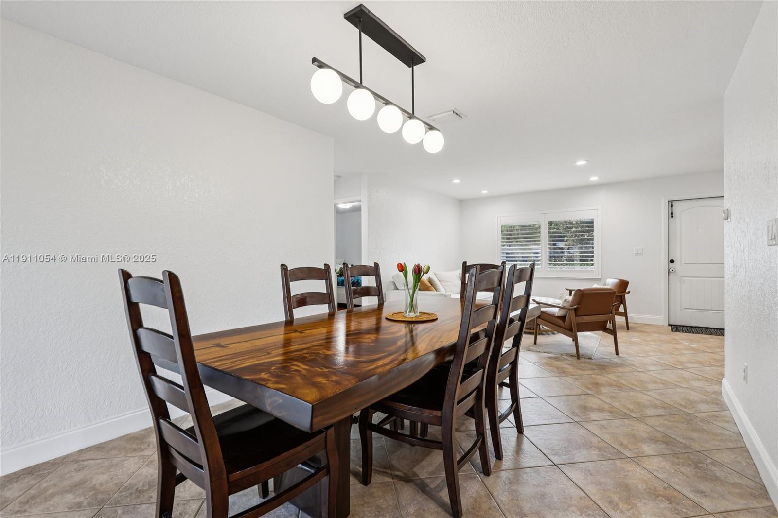6721 Southwest 135th Avenue Miami, FL 33183 - Photo 12 of 66 a view of a dining room with furniture